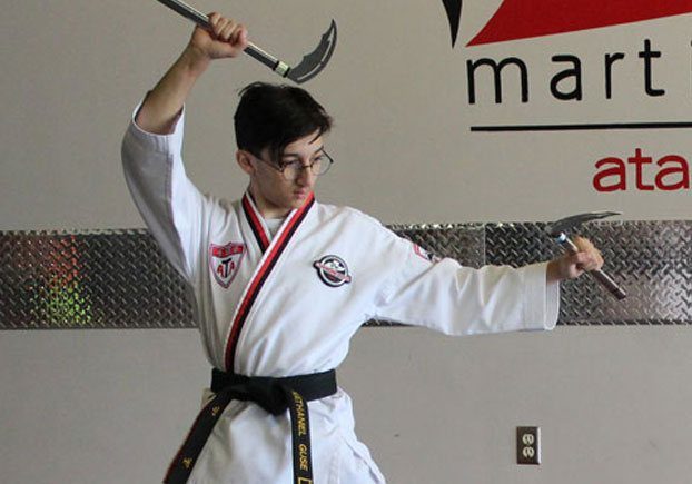 Woman pulls a gun from her swanky purse while the thief stood in the back. Conceal carry weapon for protection themselves concept. Selective focus.